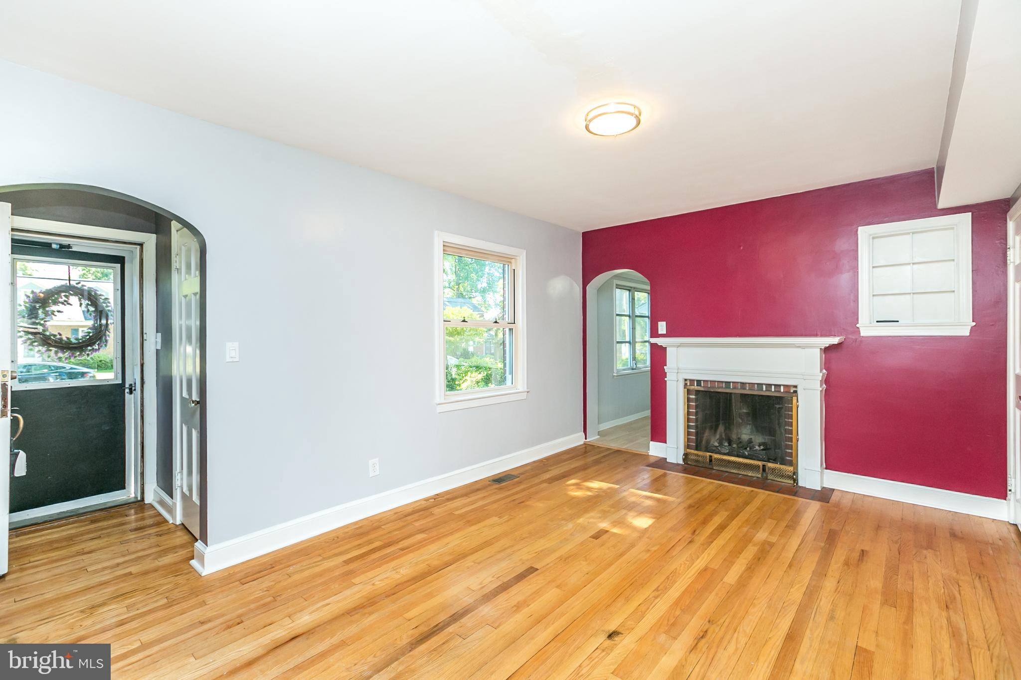 10000 Renfrew Road Silver Spring, MD 20901 - Photo 2 of 33 Living room with gas fireplace