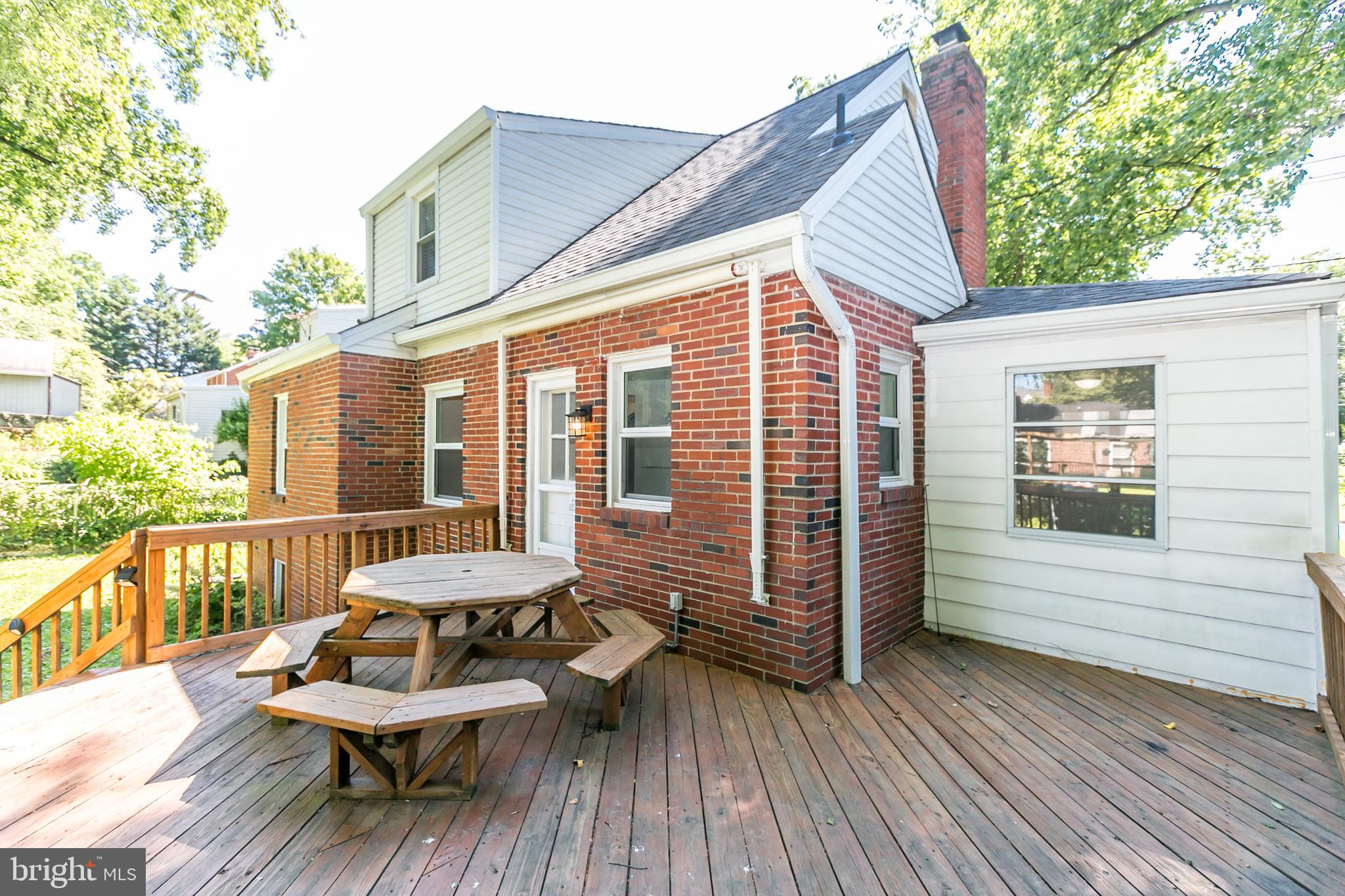 10000 Renfrew Road Silver Spring, MD 20901 - Photo 30 of 33 Rear of home with deck