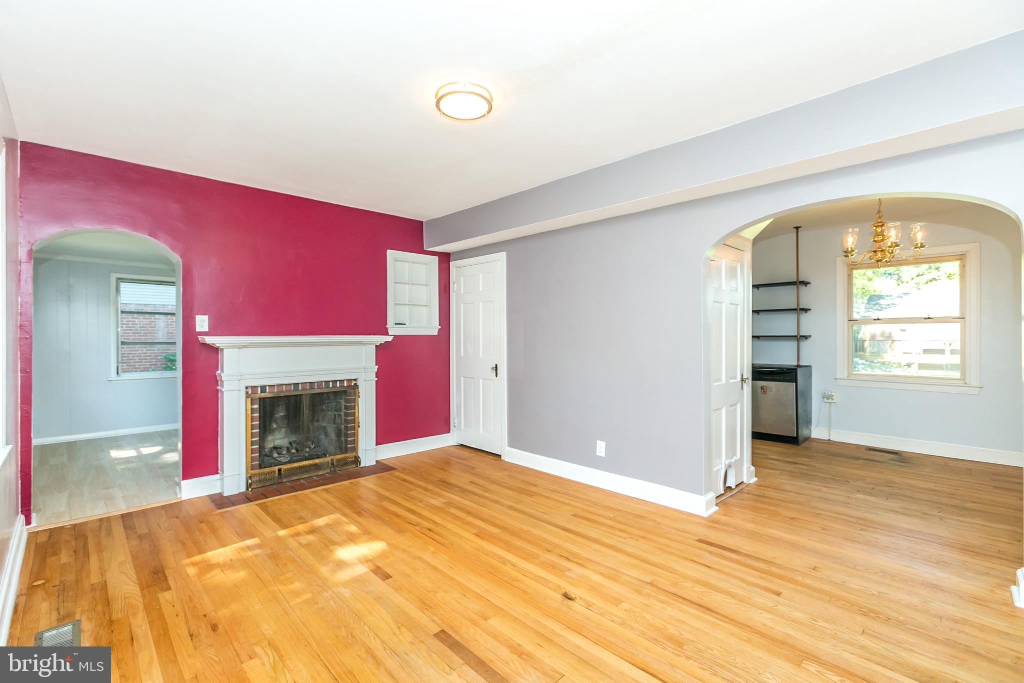 10000 Renfrew Road Silver Spring, MD 20901 - Photo 5 of 33 Living room into dining room and sun room
