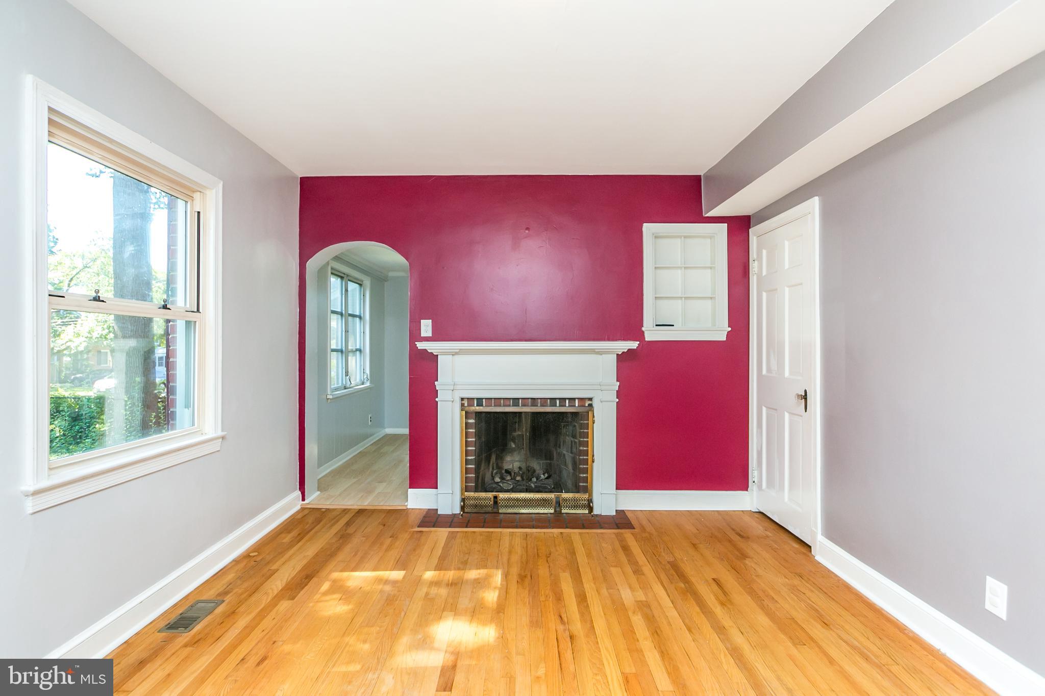 10000 Renfrew Road Silver Spring, MD 20901 - Photo 6 of 33 Living room with gas fireplace