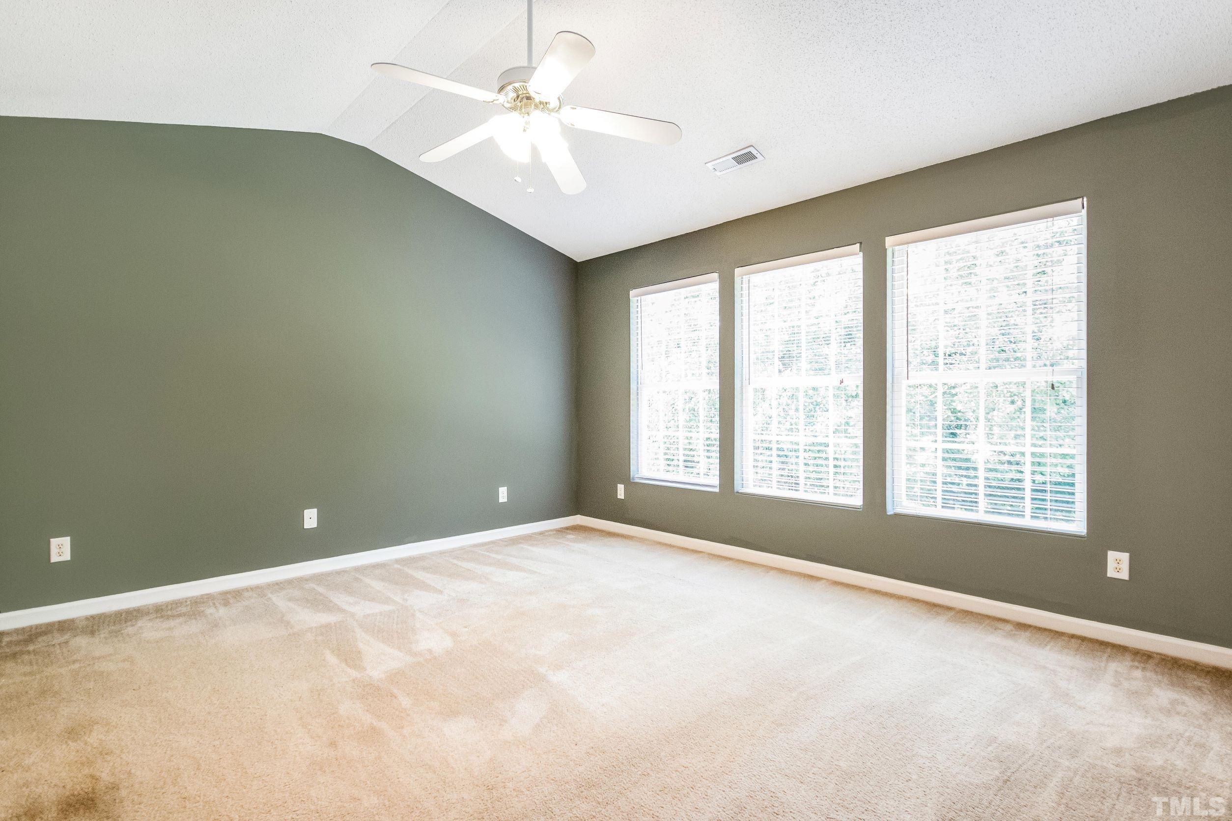 4827 Shallowbrook Trail Raleigh, NC 27616 - Photo 17 of 30 a view of an empty room with a window