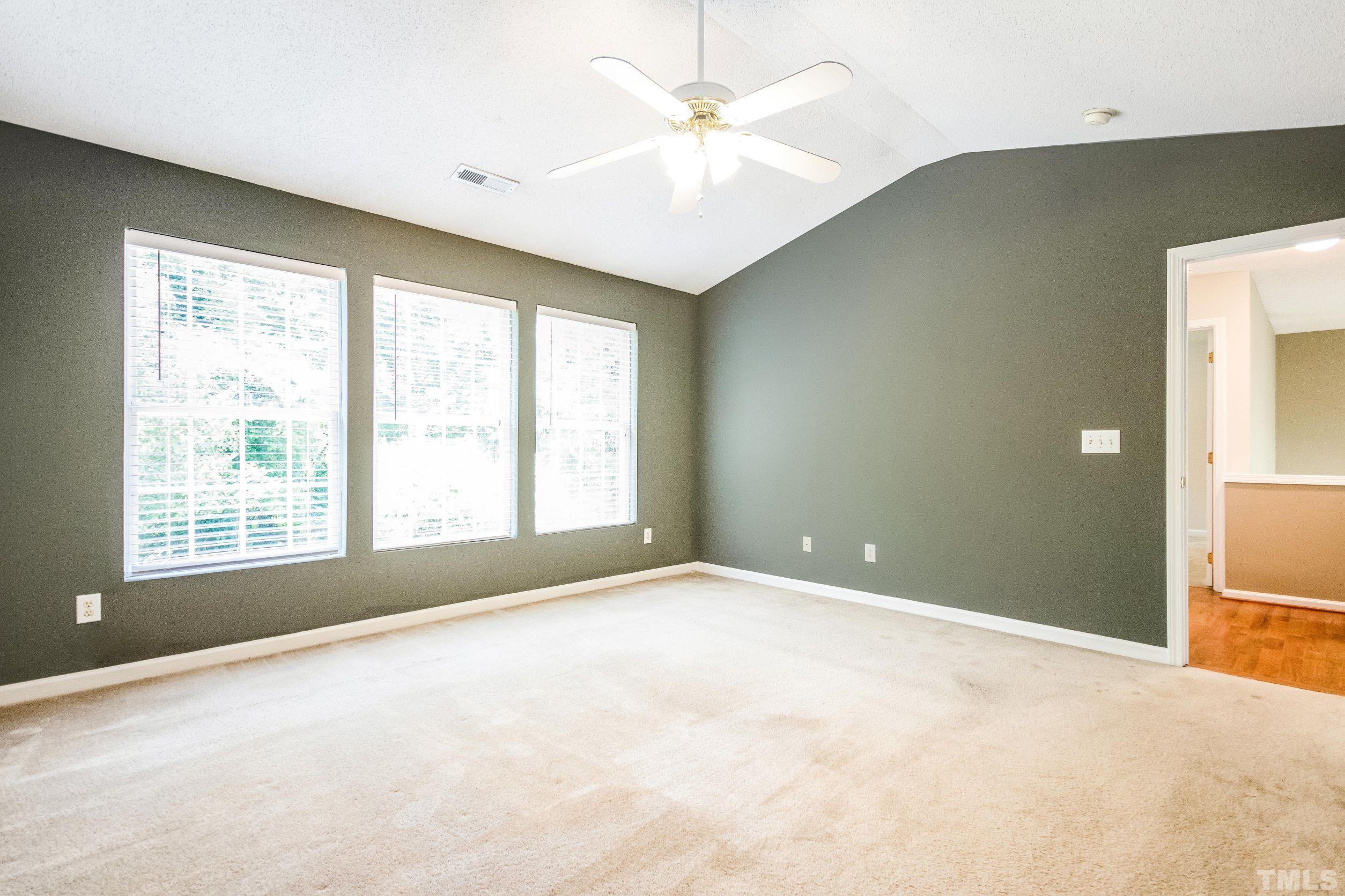 4827 Shallowbrook Trail Raleigh, NC 27616 - Photo 18 of 30 a view of an empty room with a window
