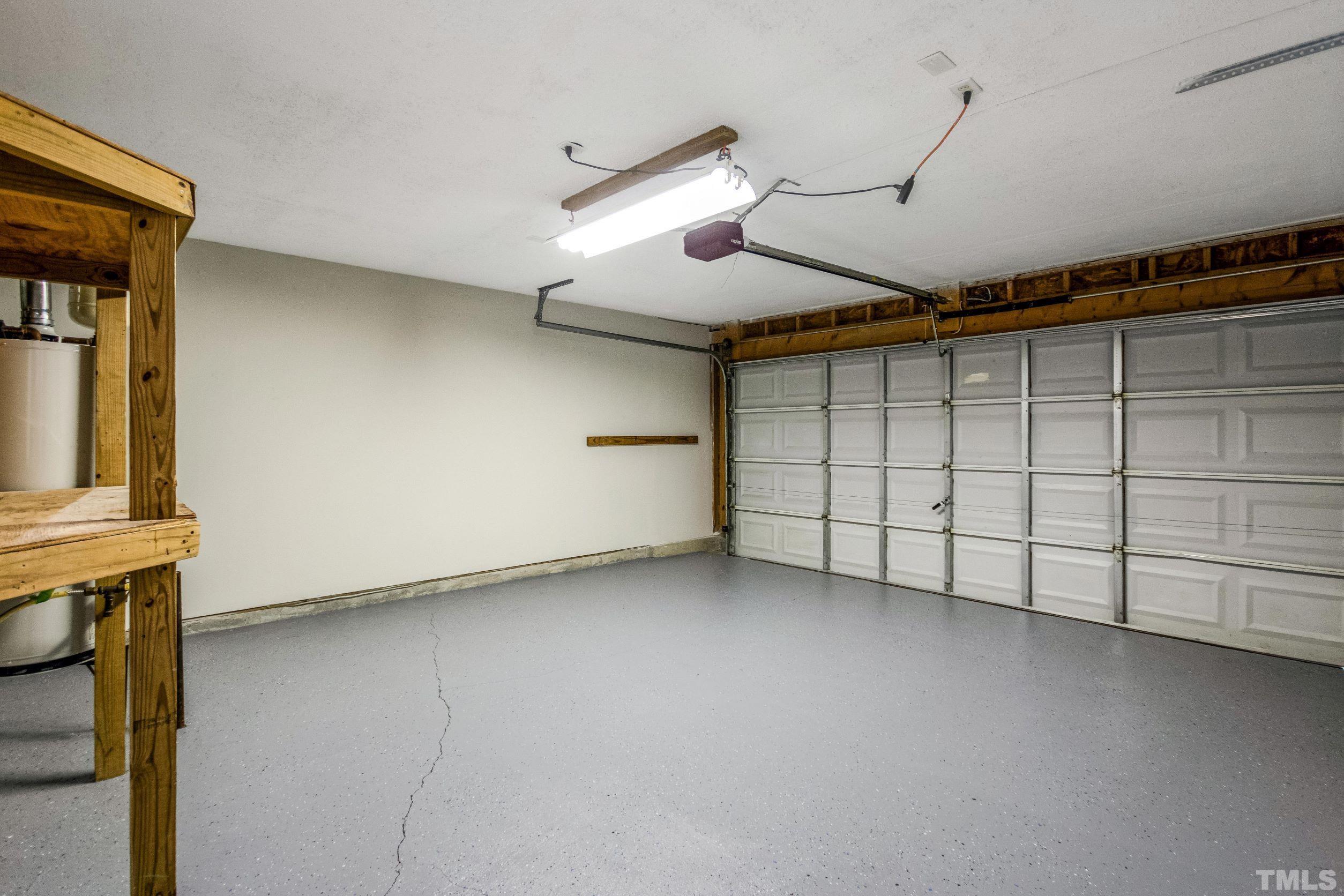4827 Shallowbrook Trail Raleigh, NC 27616 - Photo 23 of 30 a view of a garage