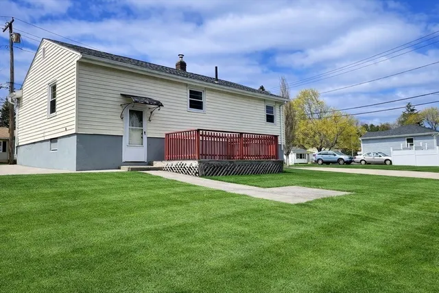 a view of a back yard of the house