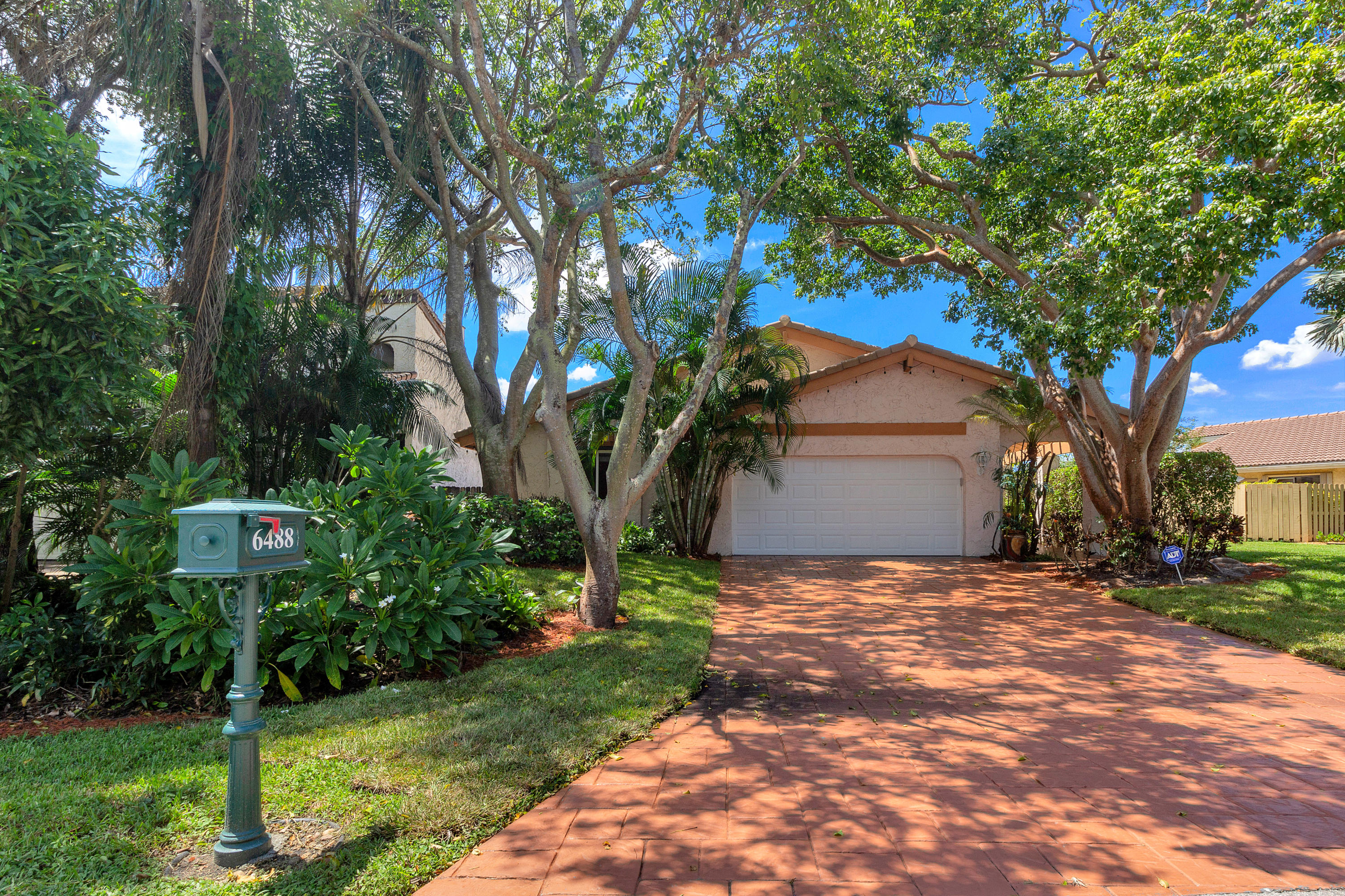 6488 Sweet Maple Lane Boca Raton, FL 33433 - Photo 1 of 38 Front Exterior - Lush Landscaping