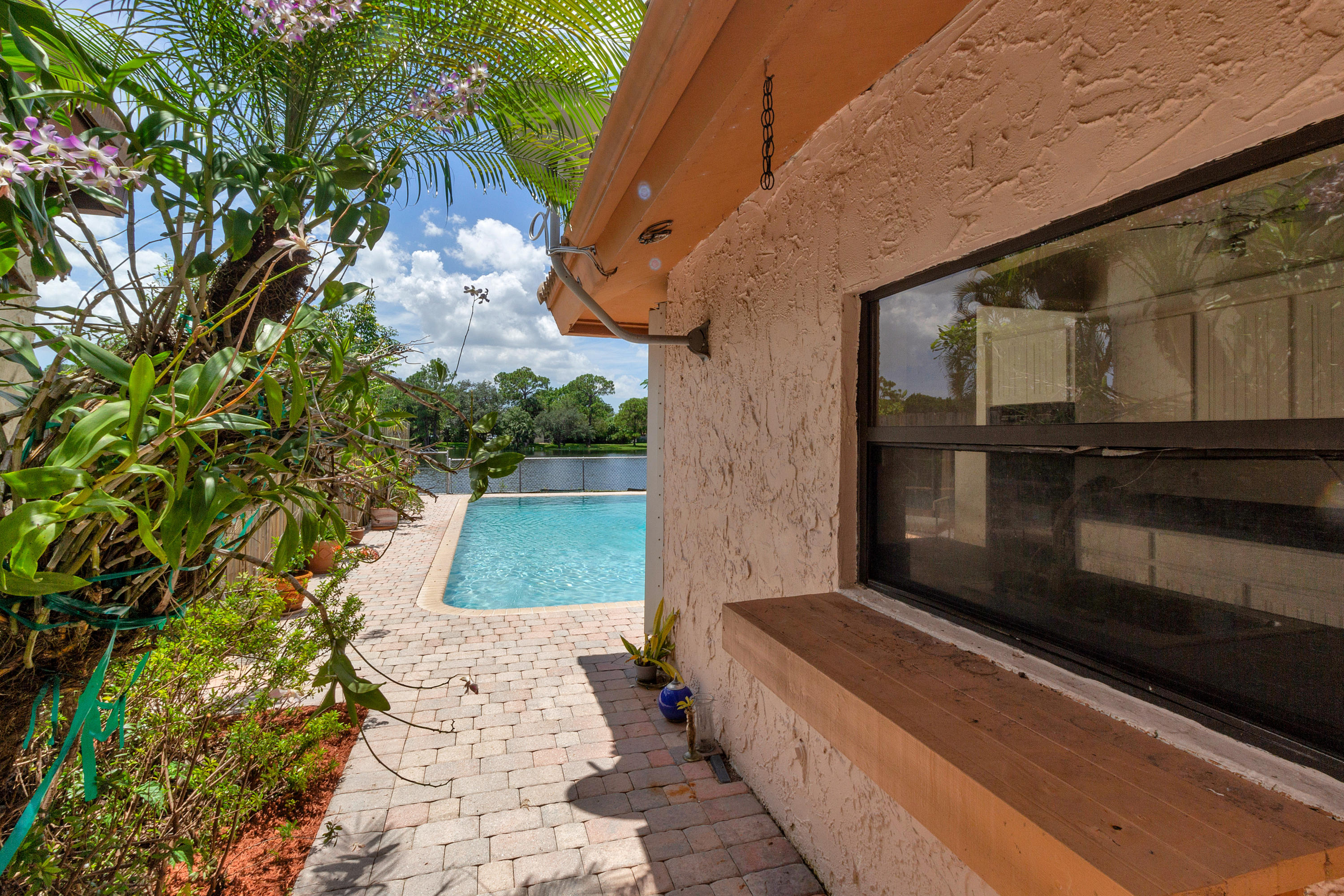 6488 Sweet Maple Lane Boca Raton, FL 33433 - Photo 31 of 38 Lush Landscaping & Water Views