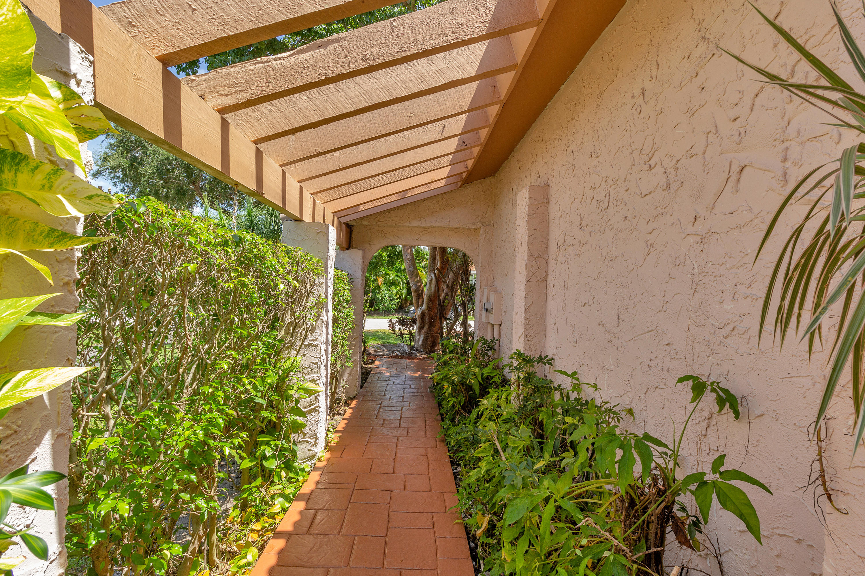 6488 Sweet Maple Lane Boca Raton, FL 33433 - Photo 5 of 38 Pretty Walkway Entrance