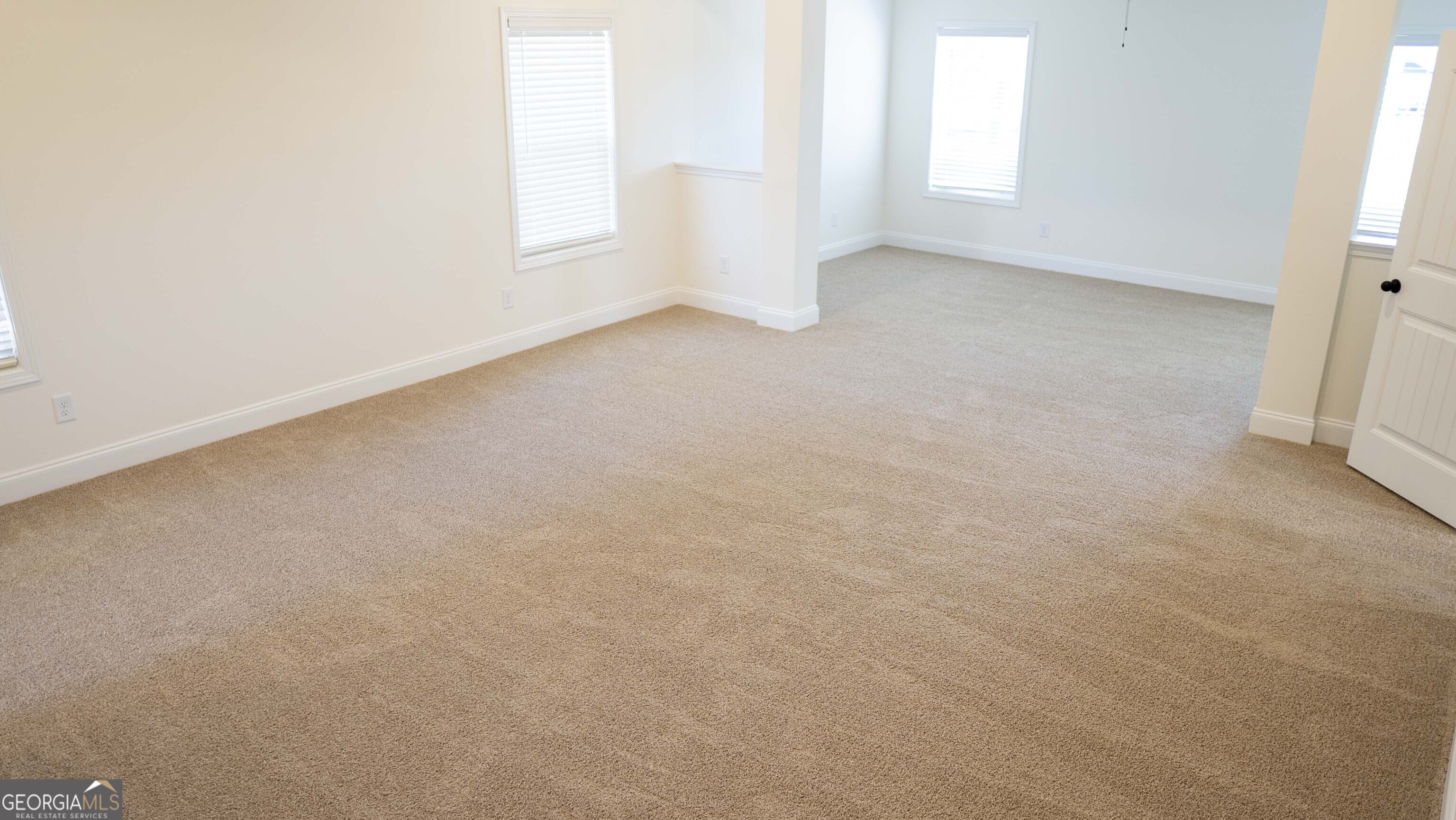 604 Beaver Court Perry, GA 31069 - Photo 21 of 40 an empty room with windows