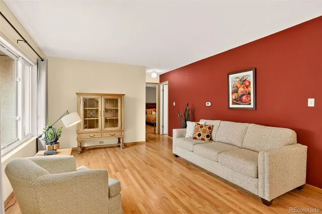 a living room with furniture and window