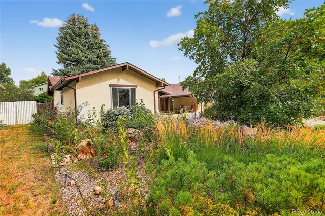 a house view with a outdoor space