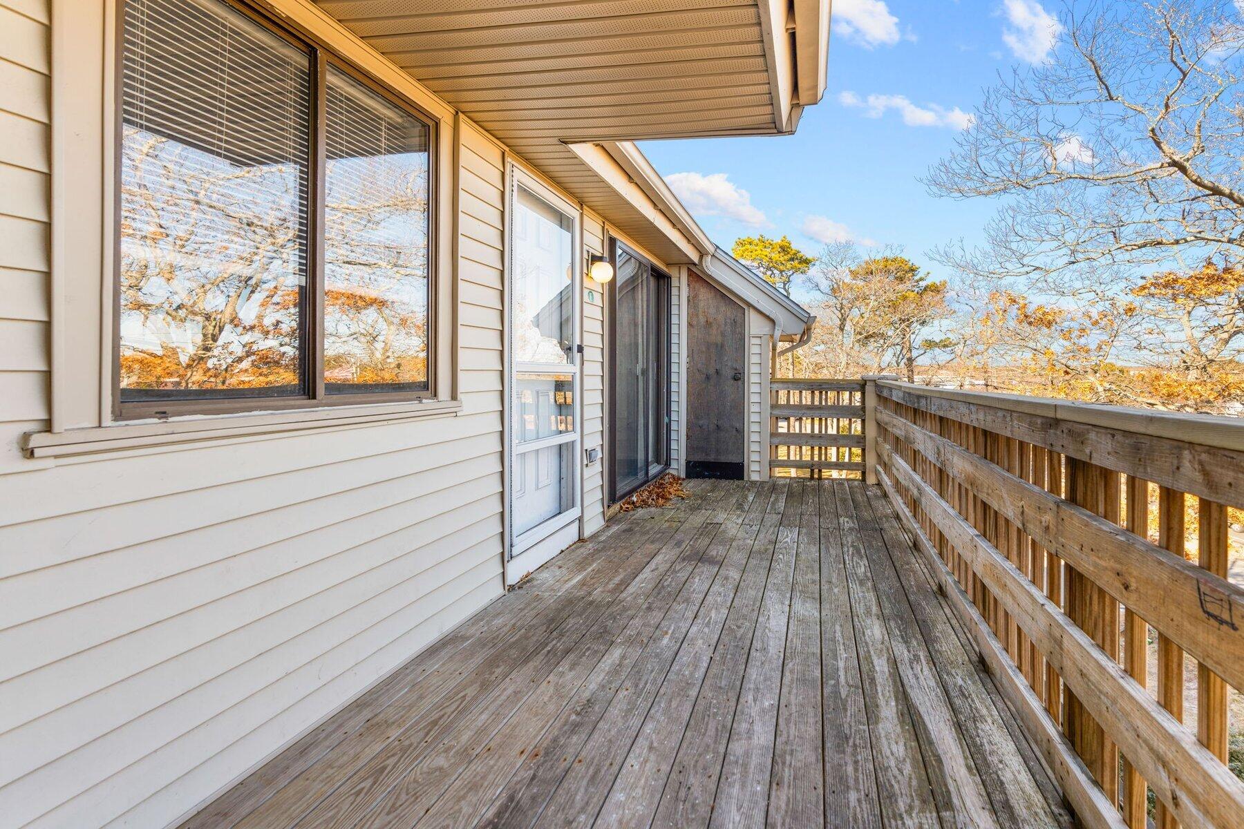 800 Bearses Way, Unit 3NF Hyannis, MA 02601 - Photo 7 of 28 a view of balcony with wooden floor