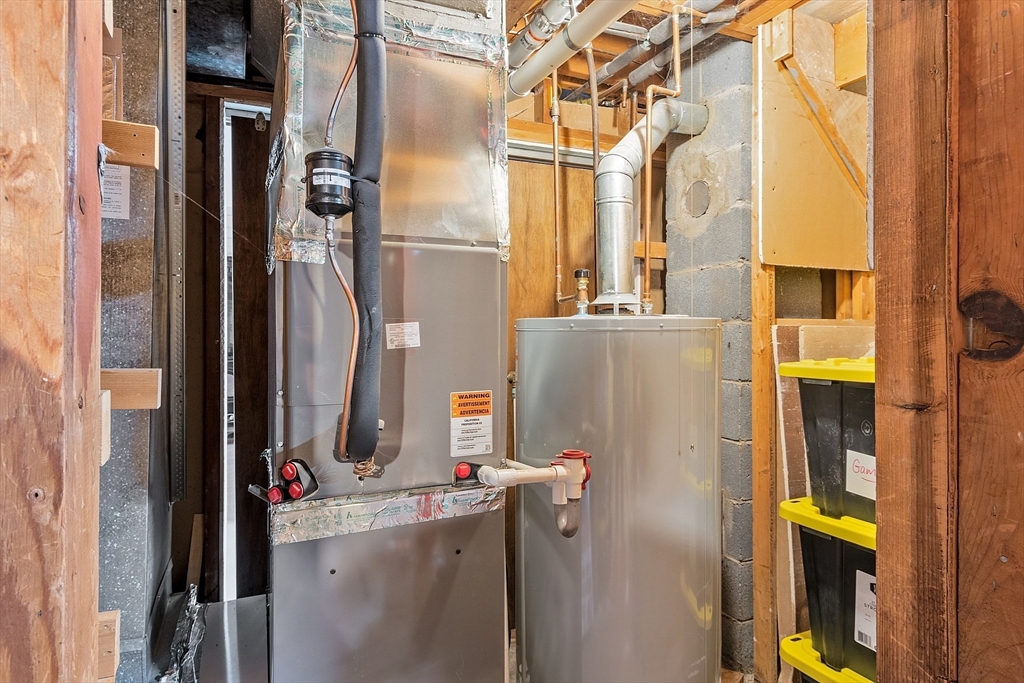 187 Mill Road Chelmsford, MA 01824 - Photo 26 of 32 a close view of a sink storage and utility