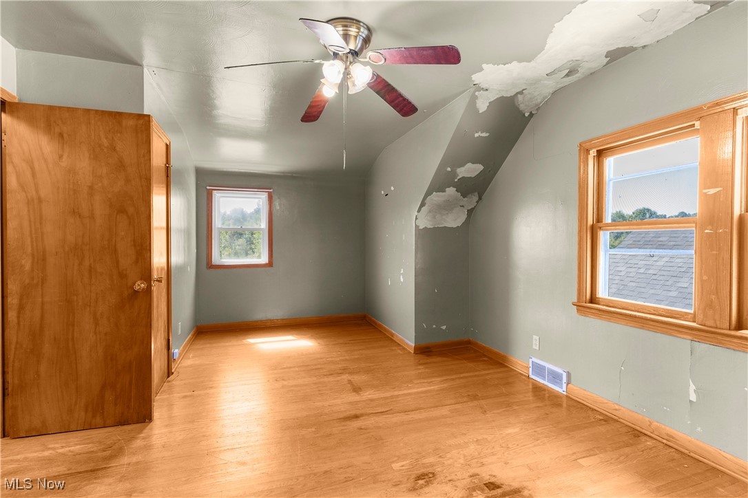6512 Warren - Sharon Road Brookfield, OH 44403 - Photo 17 of 21 Additional living space with light hardwood / wood-style flooring and ceiling fan