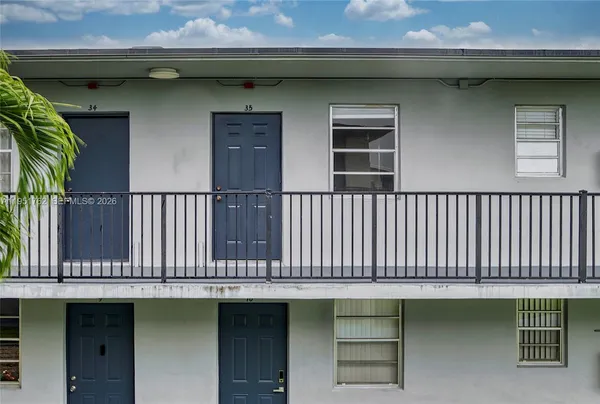 a view of a car park from a balcony