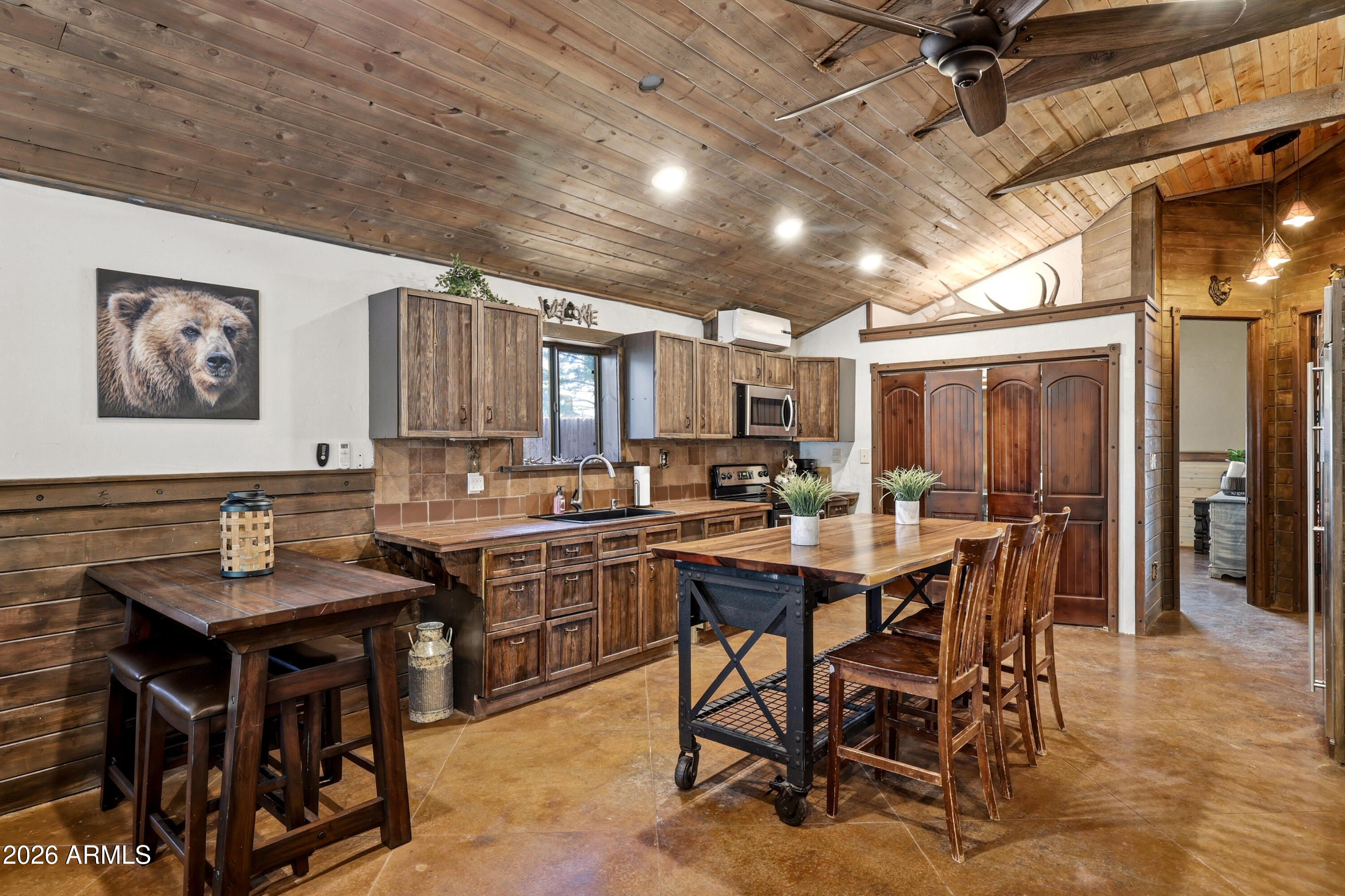 4971 Buck Springs Road Pinetop, AZ 85935 - Photo 8 of 32 a view of a dining area with furniture