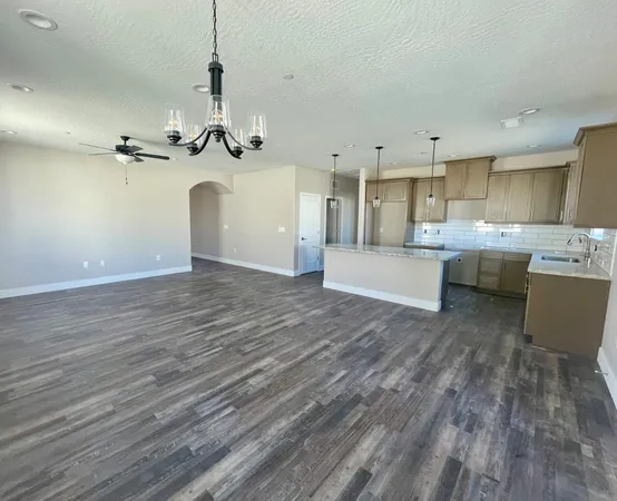 a view of a kitchen and kitchen counter space