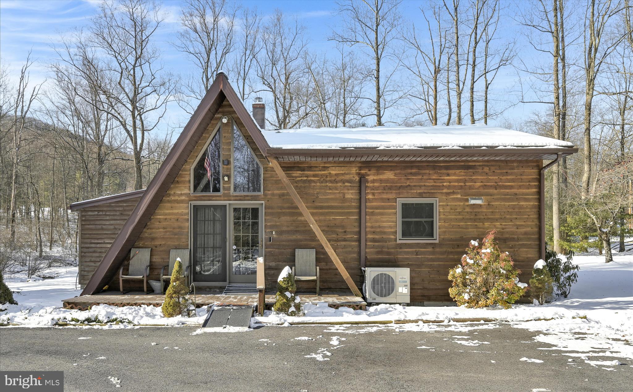 166 Camp Strauss Road Fredericksburg, PA 17026 - Photo 12 of 40 a view of a house with large windows