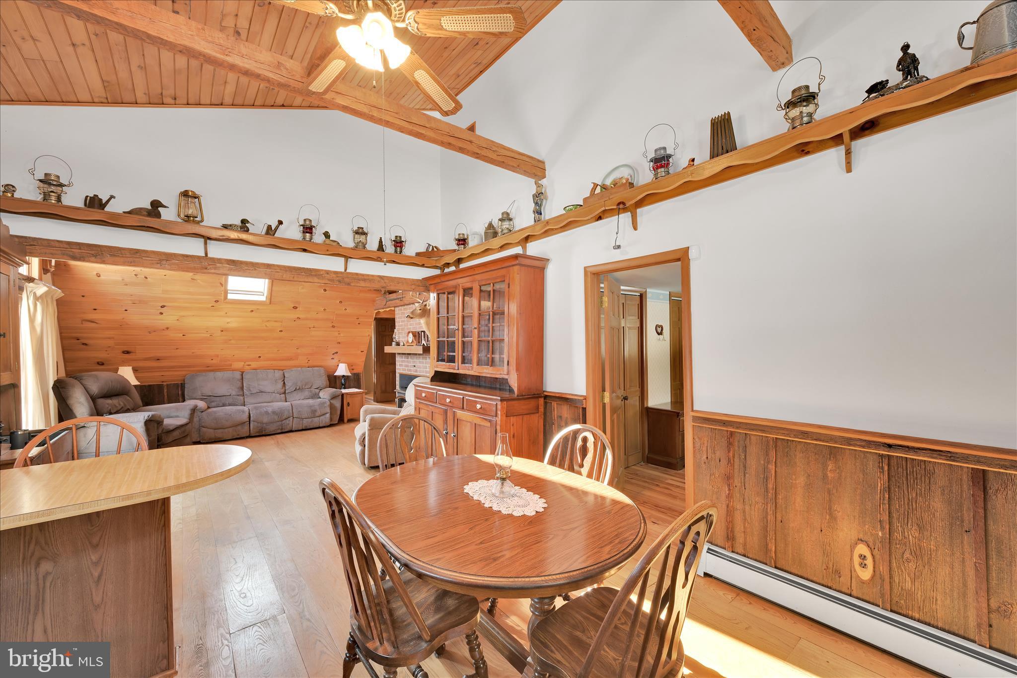 166 Camp Strauss Road Fredericksburg, PA 17026 - Photo 17 of 40 a dining room with furniture and wooden floor