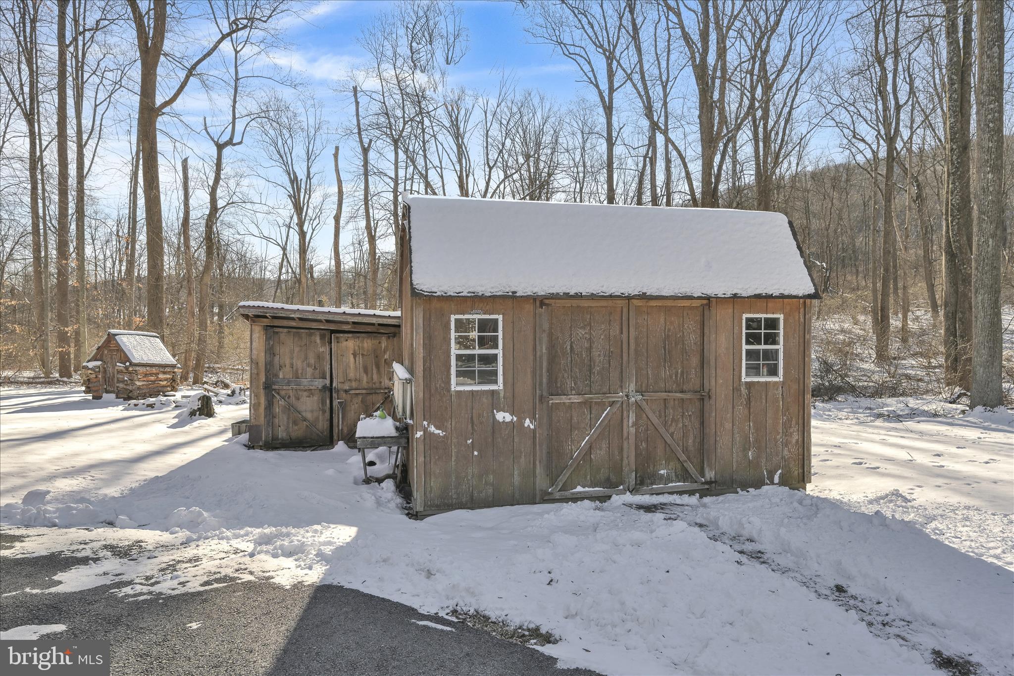 166 Camp Strauss Road Fredericksburg, PA 17026 - Photo 30 of 40 a front view of a house with a yard and garage
