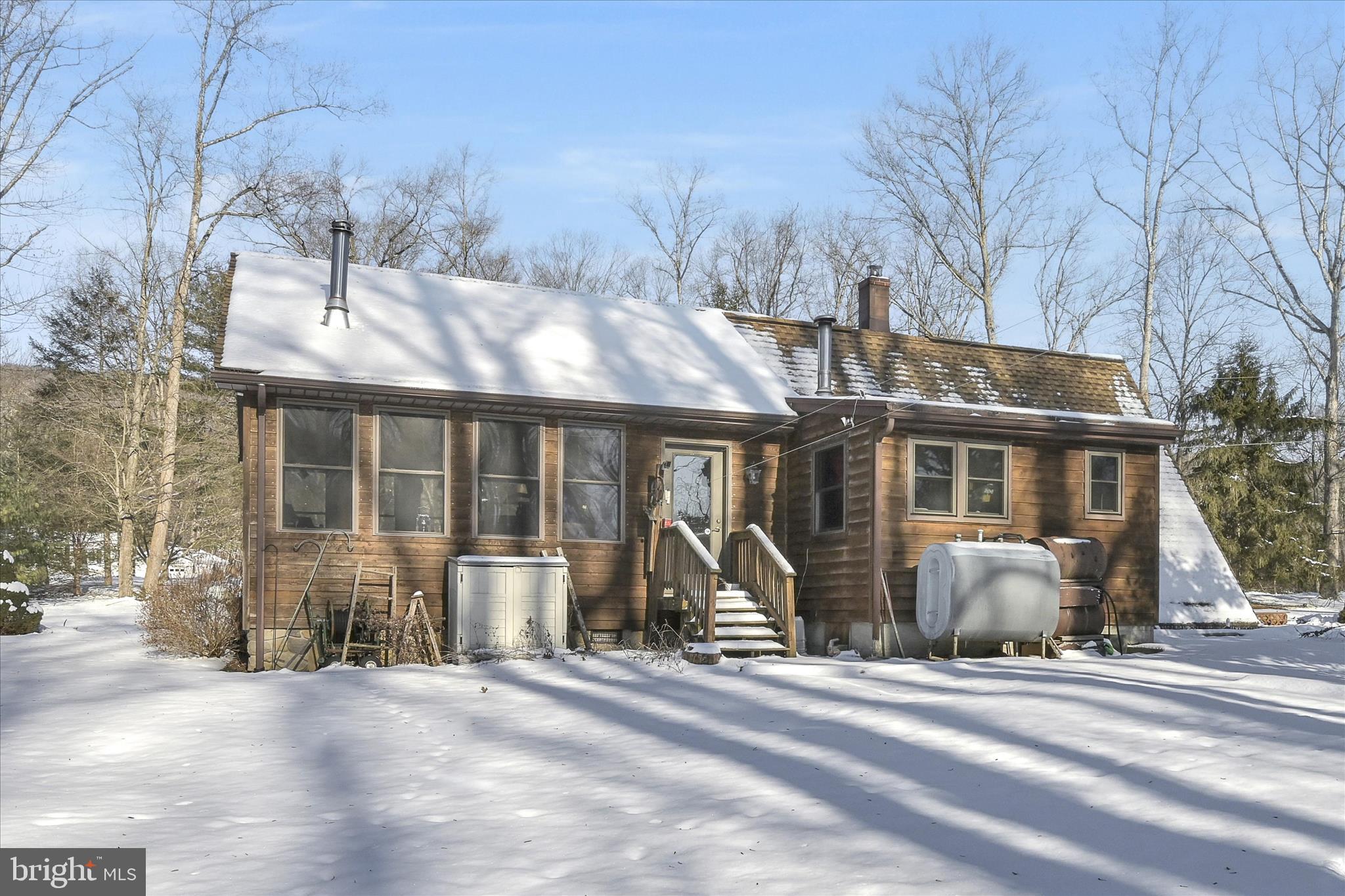 166 Camp Strauss Road Fredericksburg, PA 17026 - Photo 33 of 40 a front view of a house with a yard