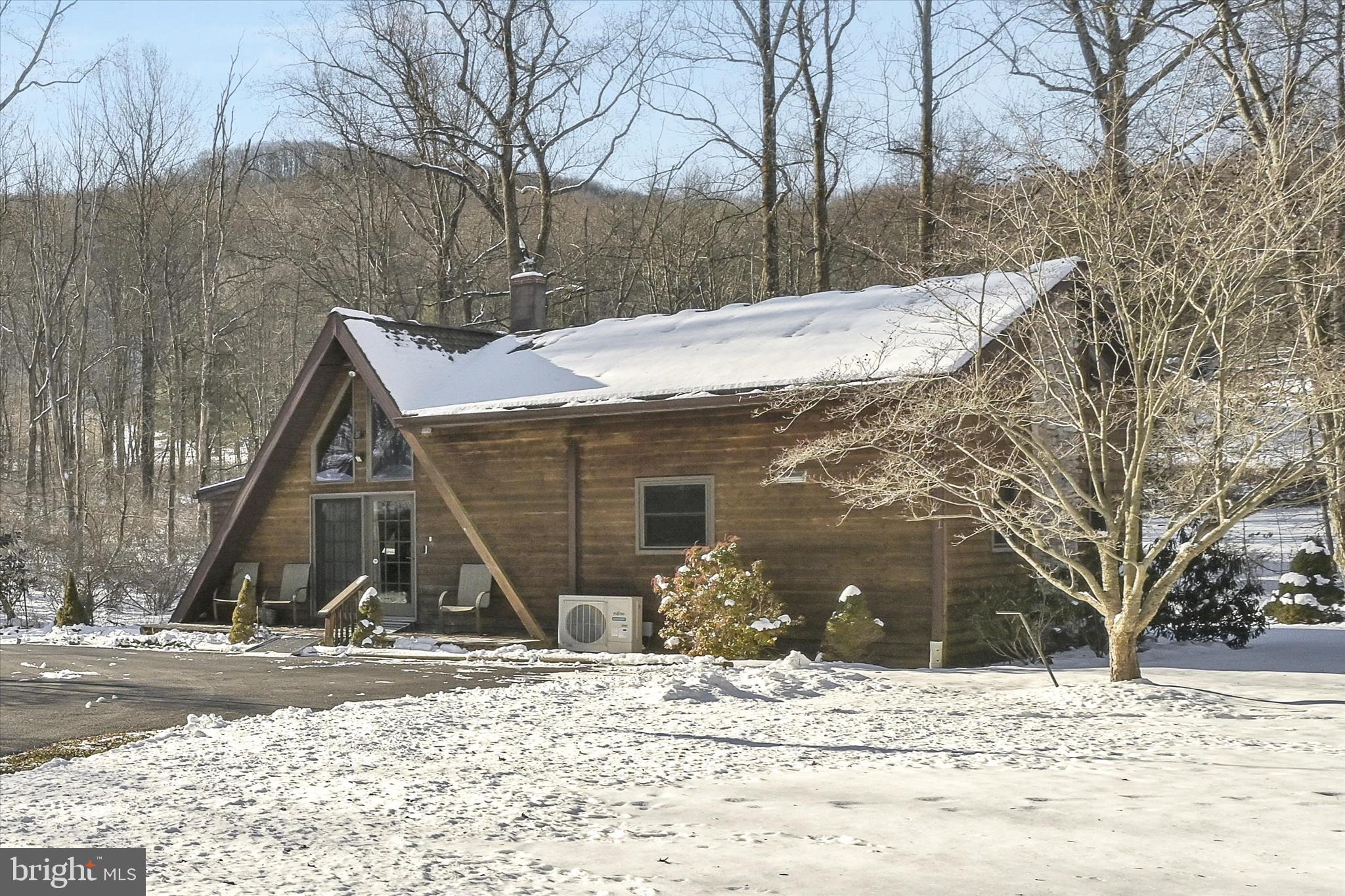 166 Camp Strauss Road Fredericksburg, PA 17026 - Photo 10 of 40 a house with trees in the background