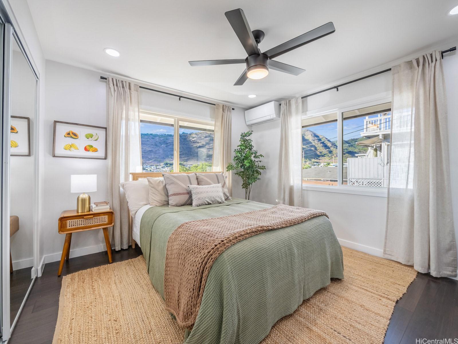 1843 A 10th Avenue Honolulu, HI 96816 - Photo 11 of 22 a spacious bedroom with a large bed and a window