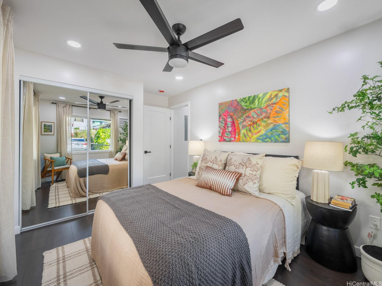 1843 A 10th Avenue Honolulu, HI 96816 - Photo 14 of 22 a bedroom with a bed and a painting on the wall