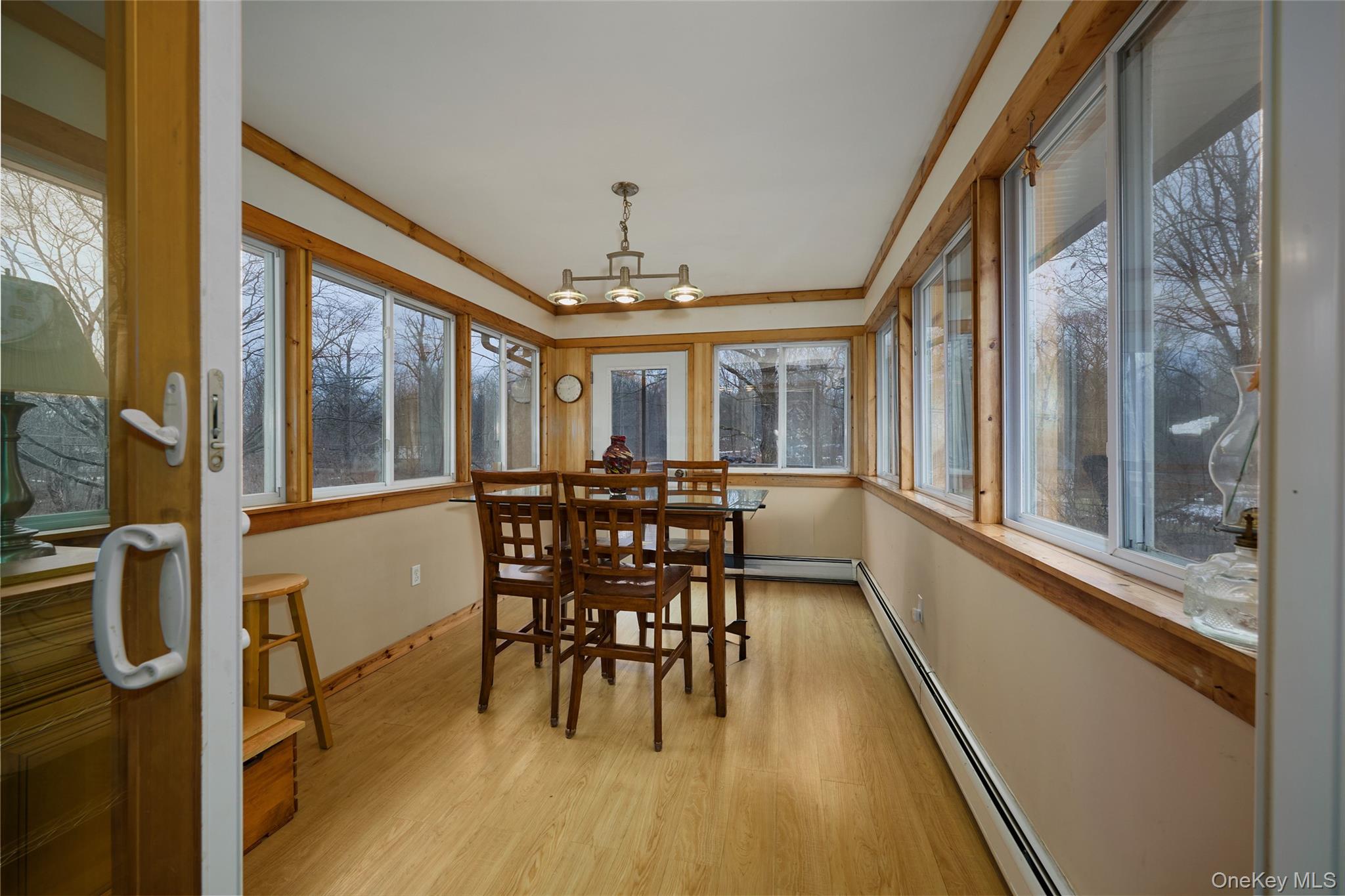 351 Freedom Road Pleasant Valley, NY 12569 - Photo 11 of 31 Fully finished and insulated. Anderson door leads from the dining area to the sun room.
