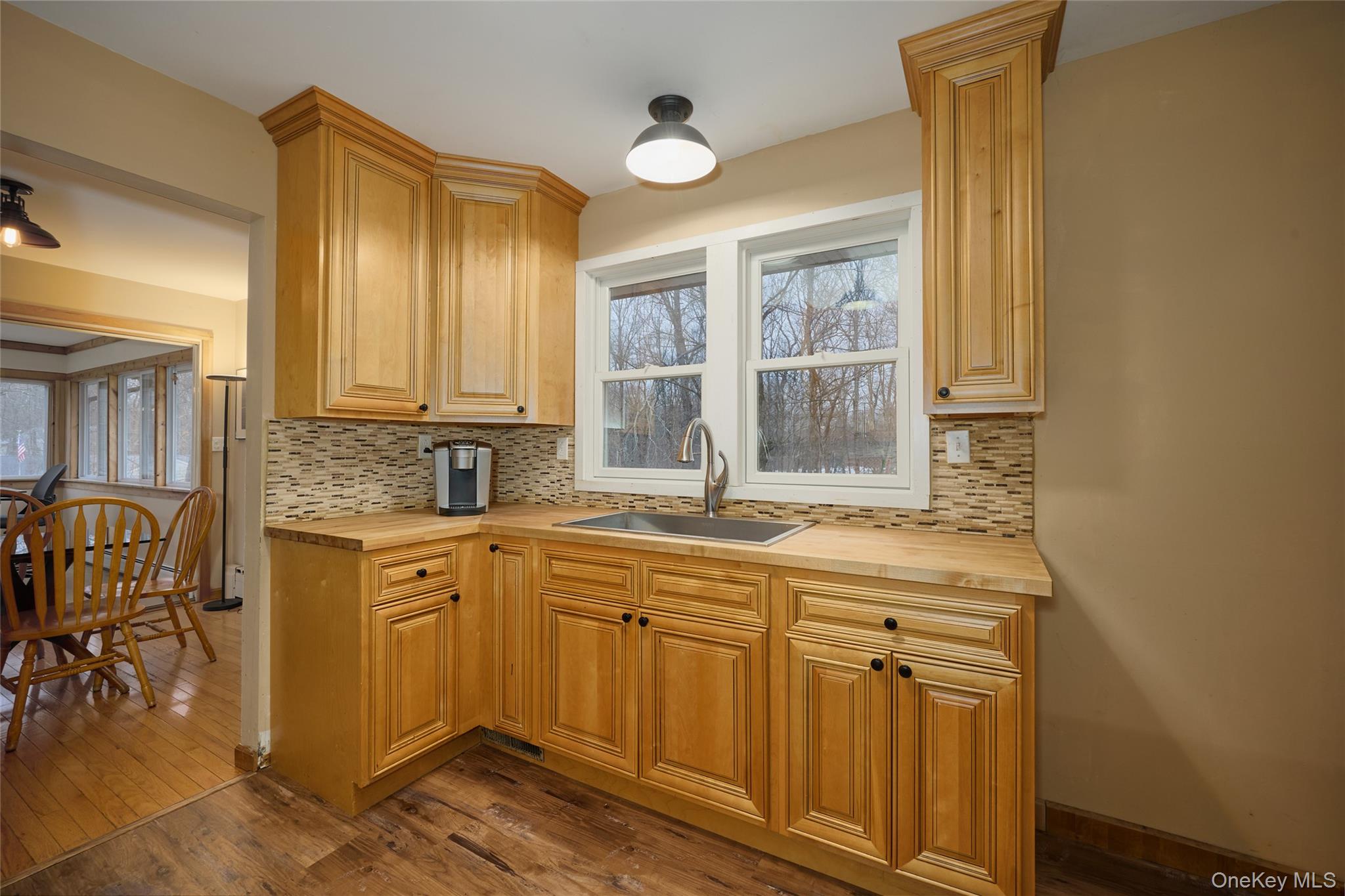 351 Freedom Road Pleasant Valley, NY 12569 - Photo 16 of 31 Wood cabinets. Window out to the backyard.