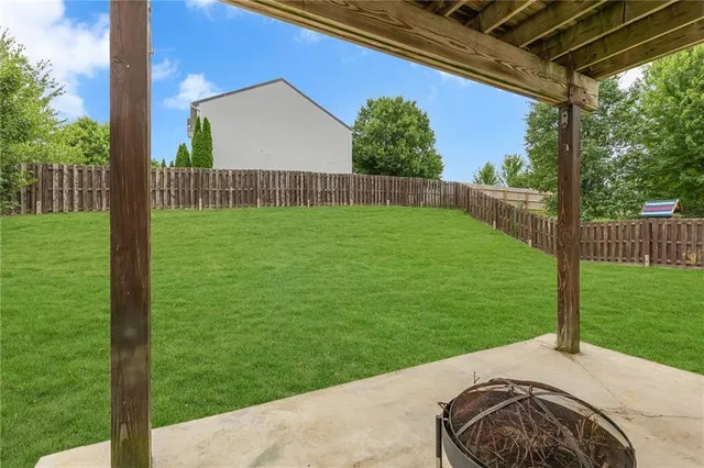 a view of a backyard with a garden