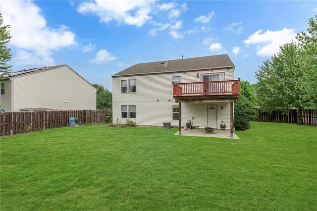 a view of backyard with a garden and entertaining space