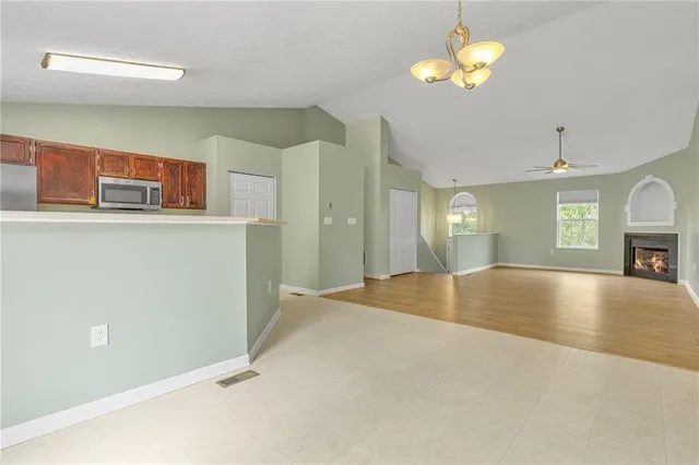 a view of livingroom and kitchen with furniture