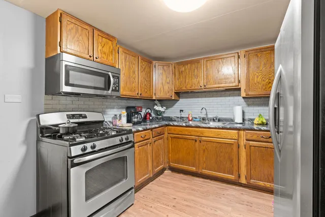 $1,095,000 | 6037 South Champlain Avenue, Chicago, IL 60637