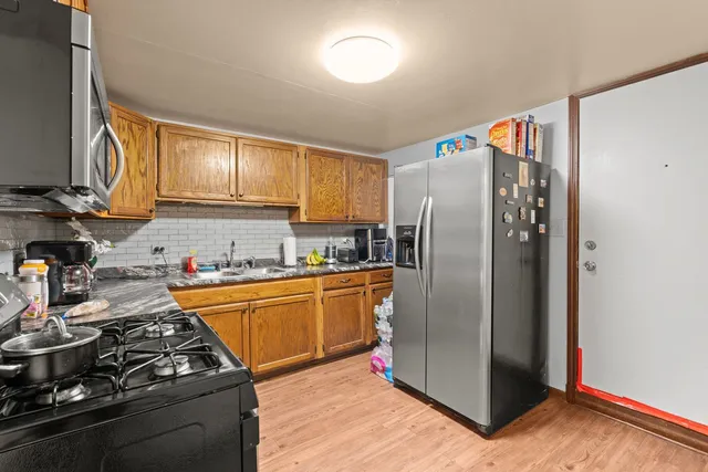 $1,095,000 | 6037 South Champlain Avenue, Chicago, IL 60637