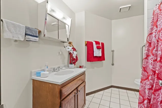 $1,095,000 | 6037 South Champlain Avenue, Chicago, IL 60637