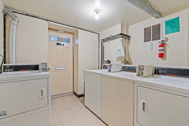 $1,095,000 | 6037 South Champlain Avenue, Chicago, IL 60637