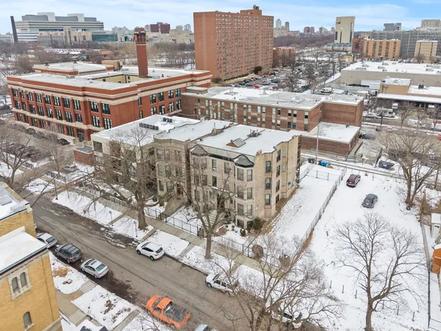 $1,095,000 | 6037 South Champlain Avenue, Chicago, IL 60637