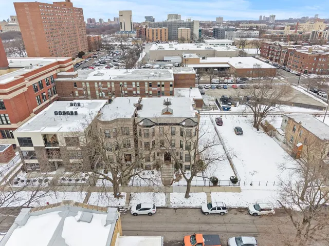 $1,095,000 | 6037 South Champlain Avenue, Chicago, IL 60637