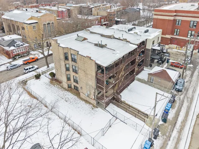 $1,095,000 | 6037 South Champlain Avenue, Chicago, IL 60637