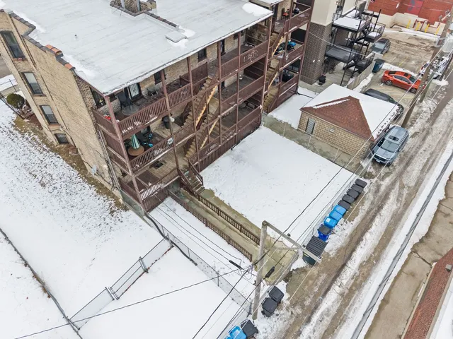 $1,095,000 | 6037 South Champlain Avenue, Chicago, IL 60637