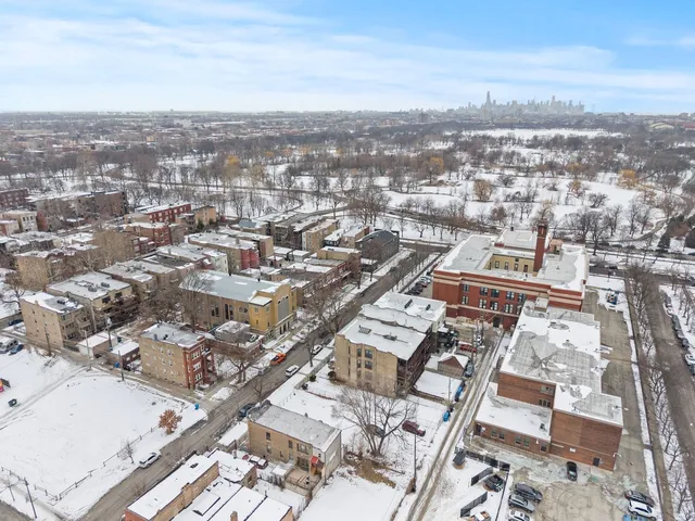 $1,095,000 | 6037 South Champlain Avenue, Chicago, IL 60637