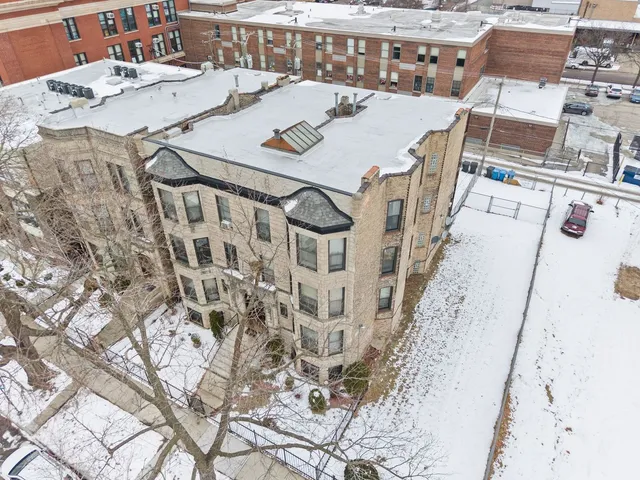 $1,095,000 | 6037 South Champlain Avenue, Chicago, IL 60637