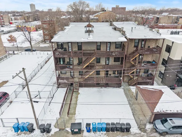 $1,095,000 | 6037 South Champlain Avenue, Chicago, IL 60637