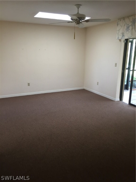 13154 Heather Ridge Loop Fort Myers, FL 33966 - Photo 7 of 15 an empty room with a ceiling fan and window
