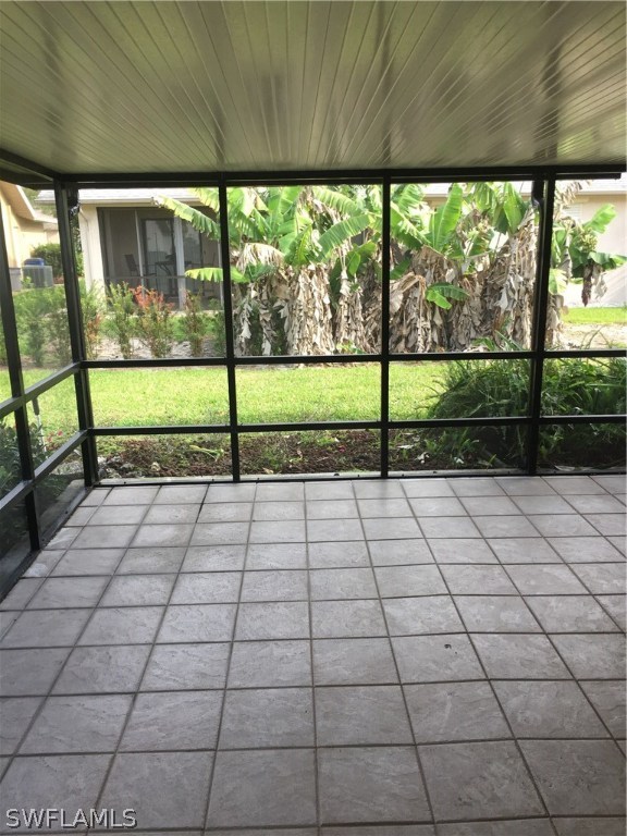 13154 Heather Ridge Loop Fort Myers, FL 33966 - Photo 8 of 15 a view of empty room with wooden floor and fan