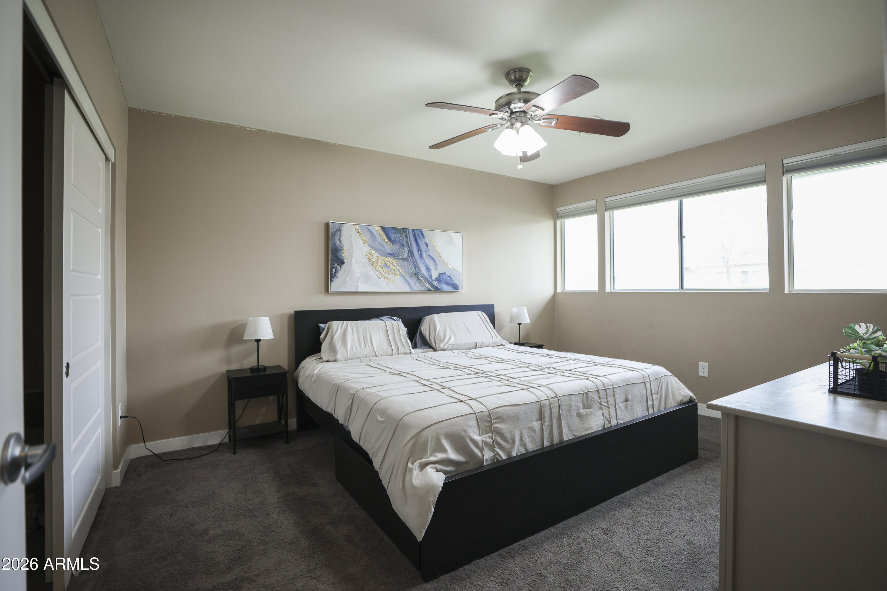 925 West McDowell Road, Unit 108 Phoenix, AZ 85007 - Photo 11 of 22 a bedroom with a bed and window