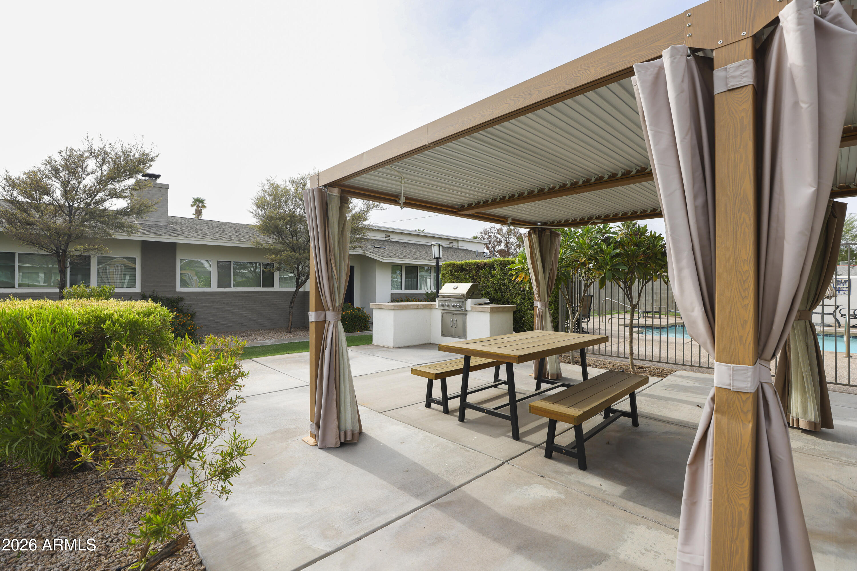 925 West McDowell Road, Unit 108 Phoenix, AZ 85007 - Photo 17 of 22 a view of a house with backyard and sitting area