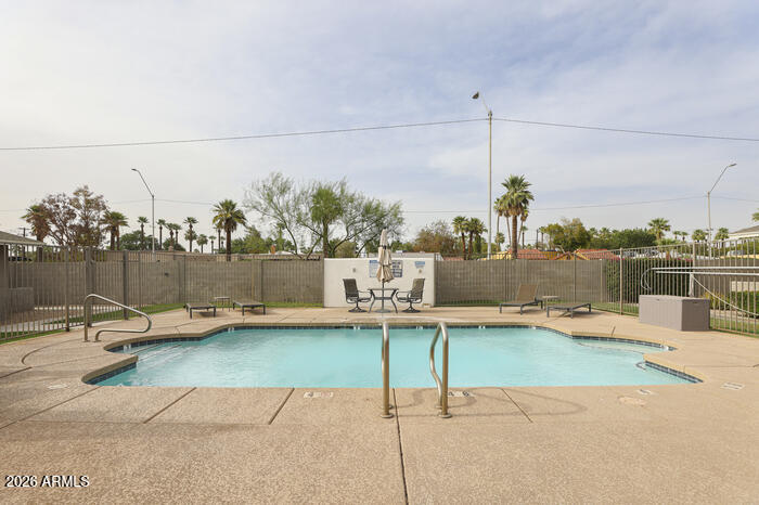 925 West McDowell Road, Unit 108 Phoenix, AZ 85007 - Photo 22 of 22 a view of a terrace with chairs