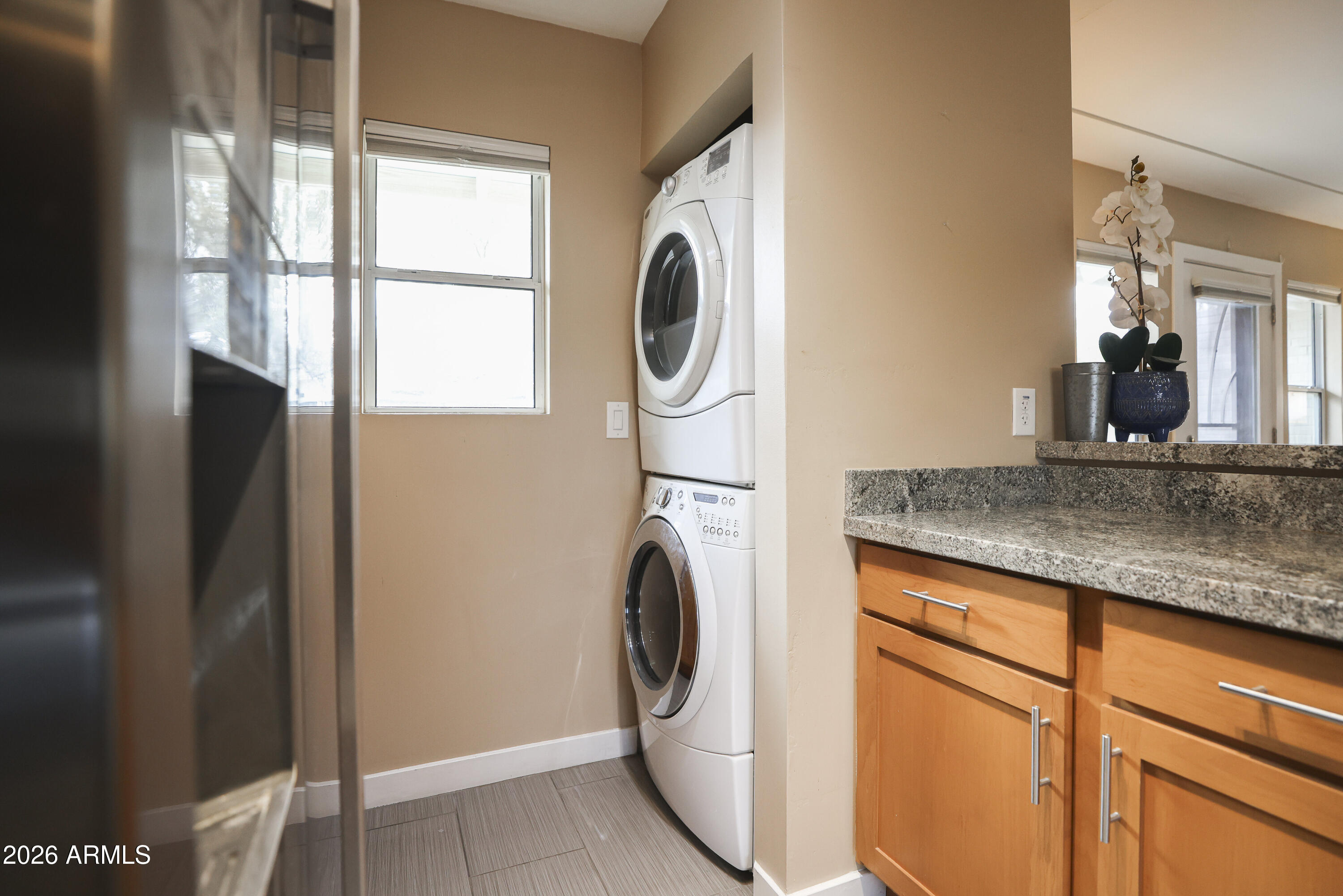925 West McDowell Road, Unit 108 Phoenix, AZ 85007 - Photo 5 of 22 a utility room with washer and dryer