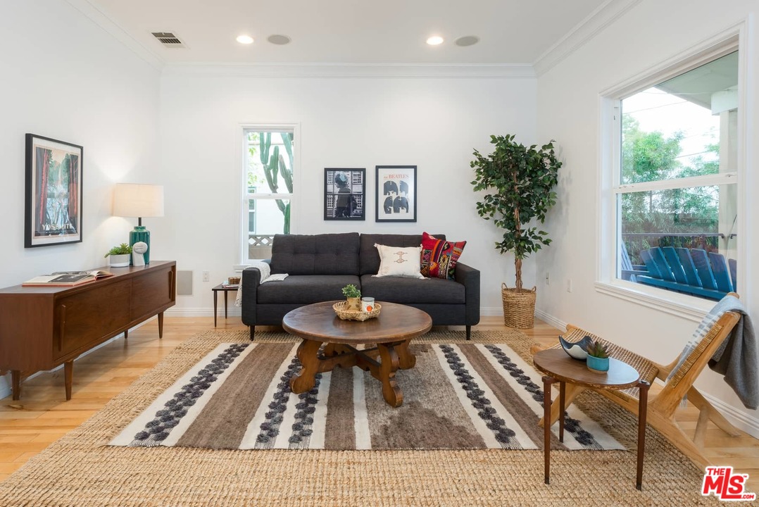 3421 Ferncroft Road Los Angeles, CA 90039 - Photo 11 of 35 a living room with furniture and a rug